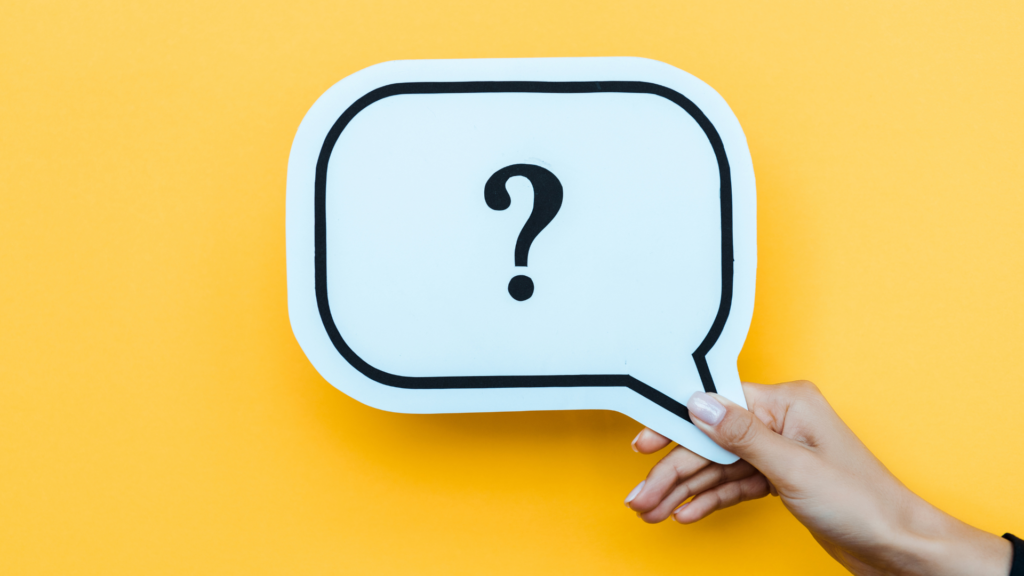 A question mark in a speech bubble